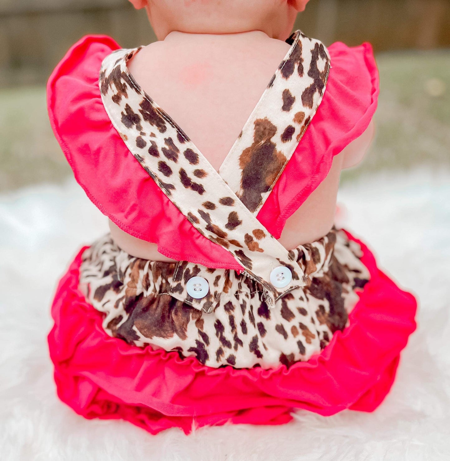 Cowhide & Pink Ruffle Romper