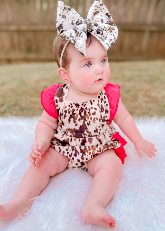 Cowhide & Pink Ruffle Romper